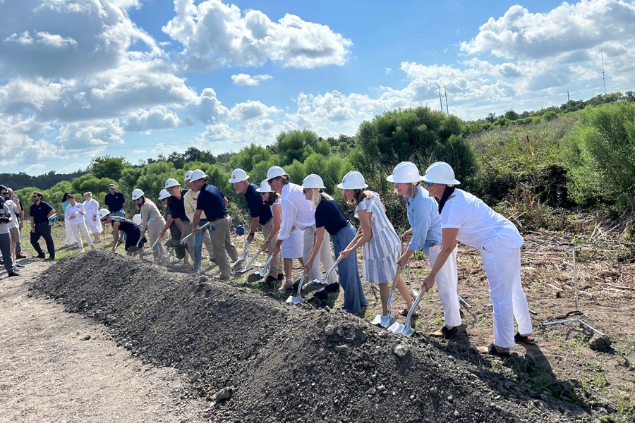 People breaking ground